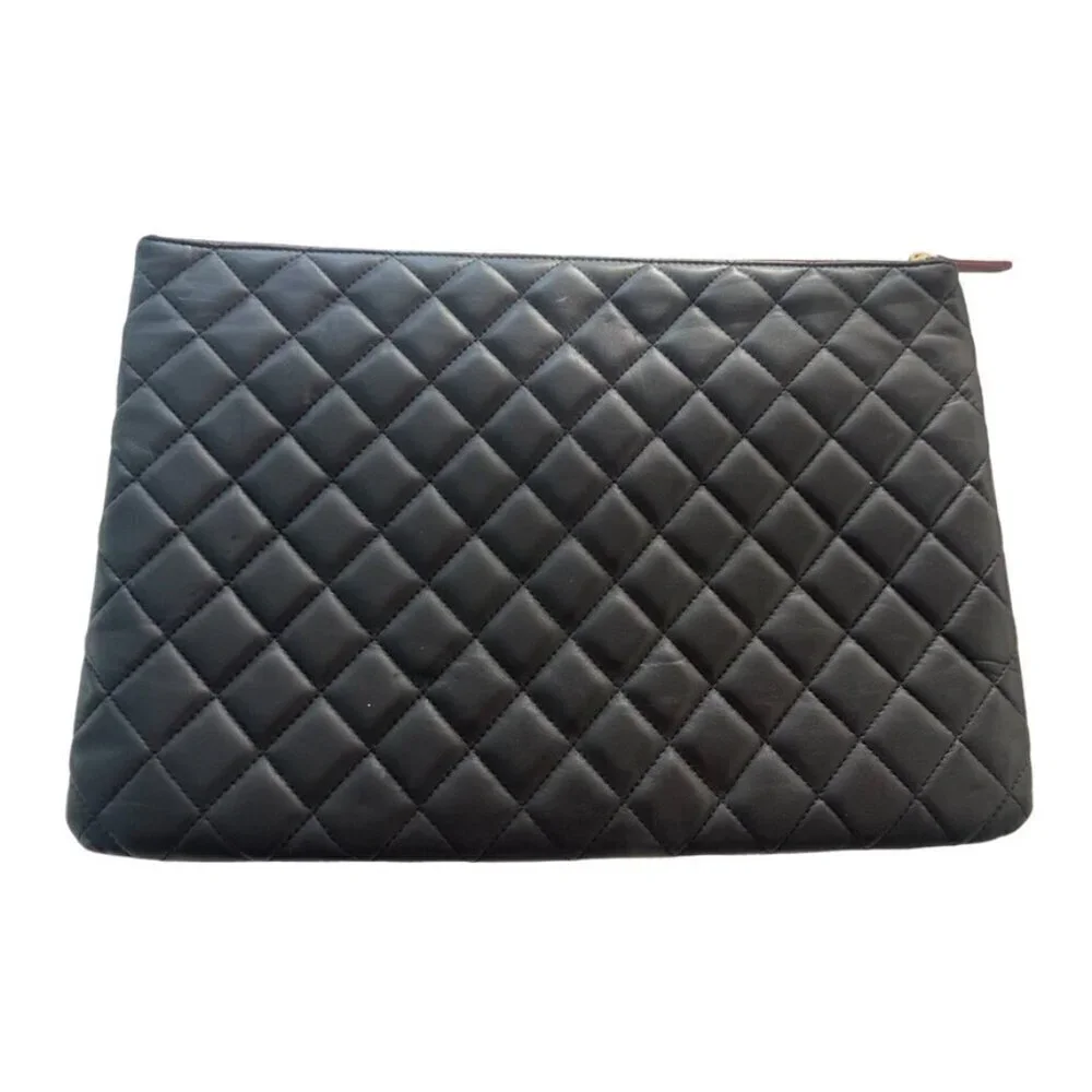 Chanel black leather lambskin leather pocket clutch / laptop sleeve
